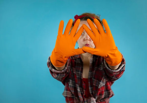 Adult Pin Woman Shows Orange Gloves Blue Background Woman Plaid — Fotografia de Stock
