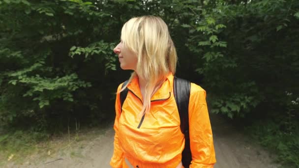 Young Blonde Woman Orange Tracksuit Stands Forest Woman Tourist Stands — Video