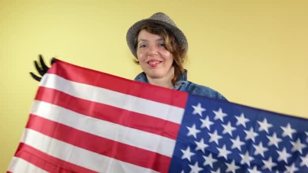 Adult American Woman Hat Denim Jacket Waving Usa Flag Isolated — Stockvideo