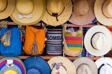 Group of hats and backpacks in the market,for sale to tourists, in Colombia