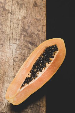 Papaya fruit on the table, top view.