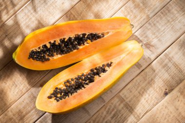 Papaya fruit on the table, top view.