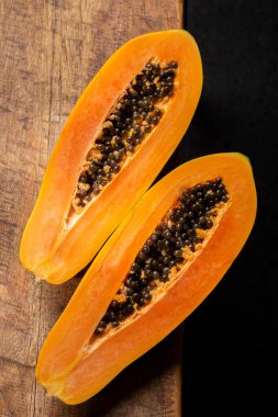 Papaya fruit on the table, top view.