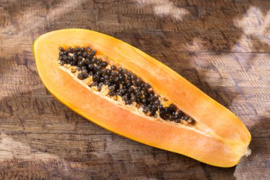 Papaya fruit on the table, top view.