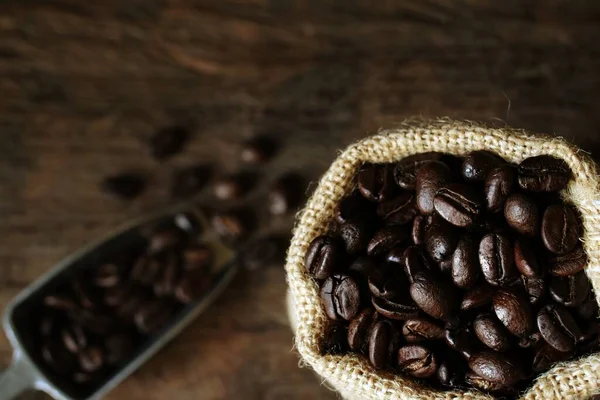 Kaffeebohnen Sack Auf Holztisch — Stockfoto