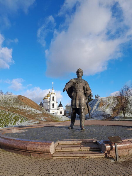 Dmitrov, Russia - November 9, 2021: Monument to Yuri Dolgoruky on the background of the Assumption Cathedral