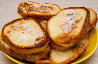 croutons fried with egg and sprinkled with sugar.