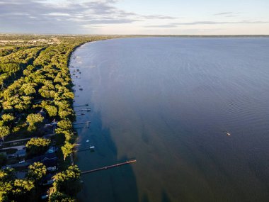 The summer shore of lake winnebago in rural wisconsin during the summertime