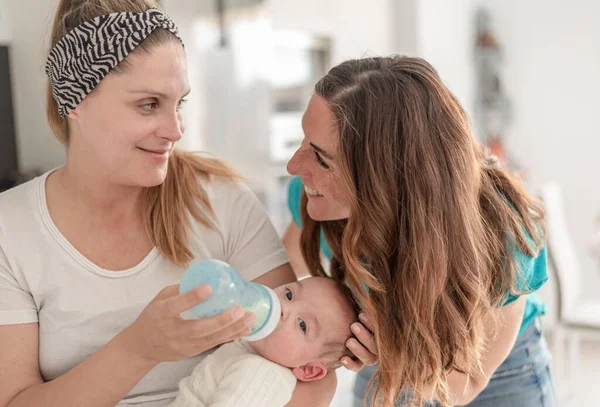 Lesbian Couple Giving Bottle Milk Baby Gay Marriage Gay Parents — Stock Photo, Image