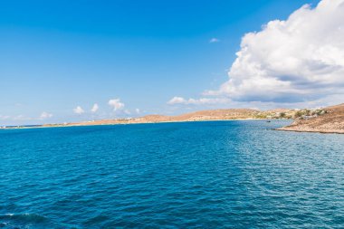 Paros island view and panorama from a ship on a beautiful colorful day, Cyclades, Aegean sea, Greece