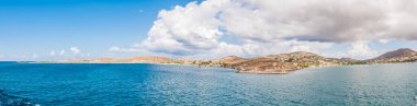 Paros island view and panorama from a ship on a beautiful colorful day, Cyclades, Aegean sea, Greece