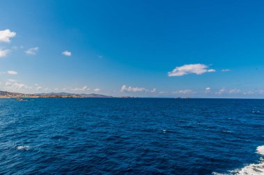 Paros island view and panorama from a ship on a beautiful colorful day, Cyclades, Aegean sea, Greece