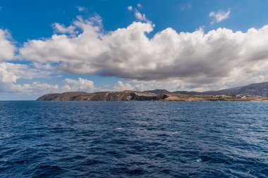 Paros island view and panorama from a ship on a beautiful colorful day, Cyclades, Aegean sea, Greece