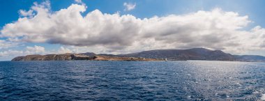 Paros island view and panorama from a ship on a beautiful colorful day, Cyclades, Aegean sea, Greece