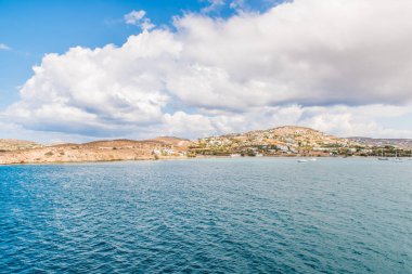 Paros island view and panorama from a ship on a beautiful colorful day, Cyclades, Aegean sea, Greece