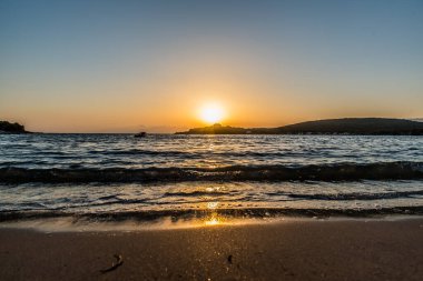 Beautiful sunset at ammoudia beach in Preveza, Epirus Greece
