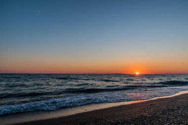 Beautiful sunset at ammoudia beach in Preveza, Epirus Greece