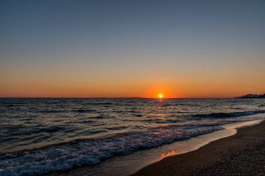 Beautiful sunset at ammoudia beach in Preveza, Epirus Greece