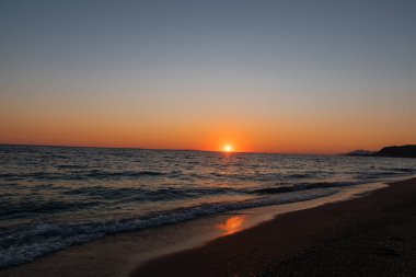 Beautiful sunset at ammoudia beach in Preveza, Epirus Greece
