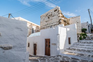 Traditional alley at Paroikia of Paros on a colorful day, Cyclades, Aegean, Greece