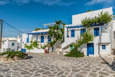 Traditional alley at Paroikia of Paros on a colorful day, Cyclades, Aegean, Greece