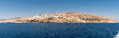 Panorama of Syros island from the ship at distance, Cyclades, Aegean, Greece
