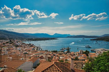 Poros island on colorful day in Aegean, Greece