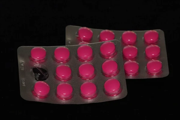 Pink Tablets Pills Blister Black Background — Stock Photo, Image