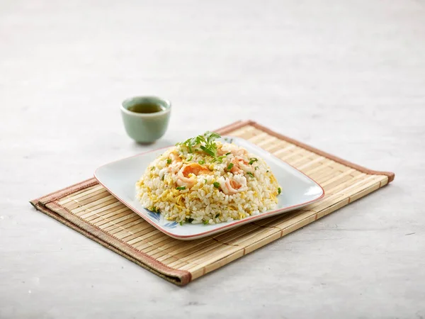 Fried Rice Diced Prawns Sauce Isolated Wooden Mat Side View — Zdjęcie stockowe