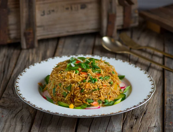 Chinese Fried Rice Served Dish Isolated Wooden Background Side View — Zdjęcie stockowe