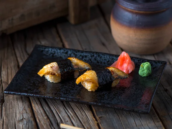 Unagi Authentic Nigiri Served Dish Isolated Wooden Background Side View — Fotografie, imagine de stoc