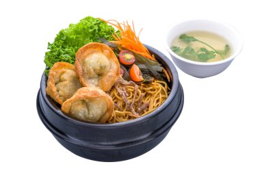 Handmade Dumpling Dry Ramen served in a dish isolated on plain white background side view of Dry Ramen Bowl