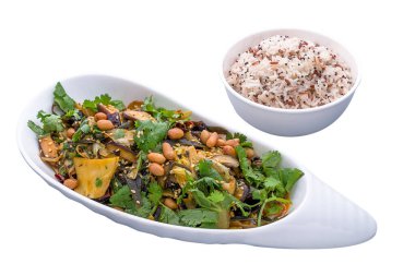 Ma La Xiang Guo with Rice served in a dish isolated on plain white background side view