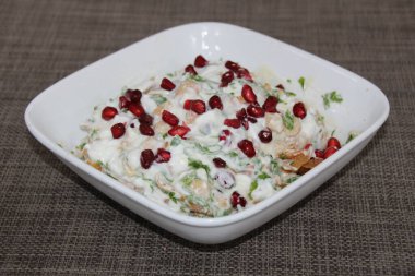 Healthy food Fatteh served in a dish isolated on grey background side view