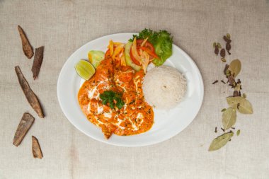 Machli begam bahar or fish curry, fish masala and fish karahi with rice served in a dish isolated on table top view of indian spices food