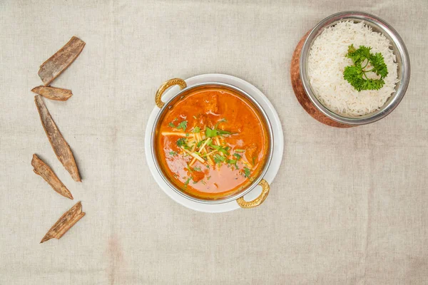 Kandahari karahi ghost with white rice served in a dish isolated on table top view of indian spices food