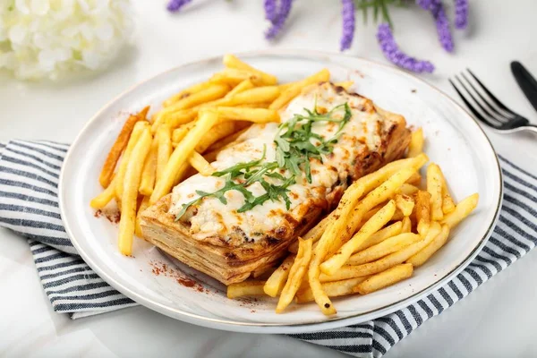 LE VOL Au VENT french puff pastry filling with chicken, cream and fries served in a dish isolated on table side view of arabian main course food