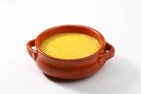 CHICKEN CORN SOUP served in a bowl isolated on grey background side view of arabian fastfood