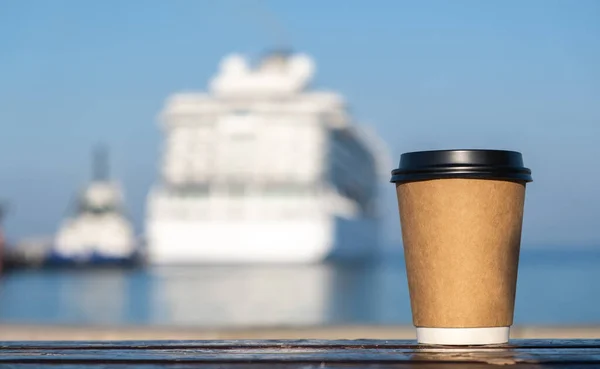 Coffee craft cub on sea side in Kusadasi, Turkey, background with cruise ship