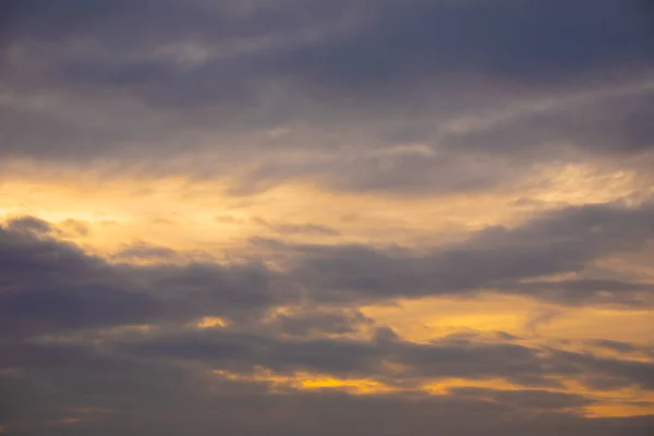 Dark sky background with dramatic thunder clouds and sunlight, sky background