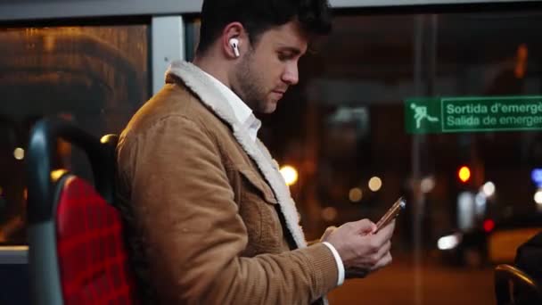 Man watching video in bus — Stock Video