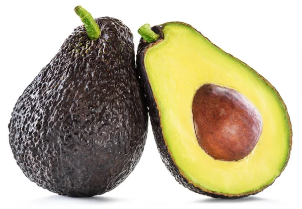 Avokado ve avokadonun yarısı beyaz arka planda izole edilmiş.. 
