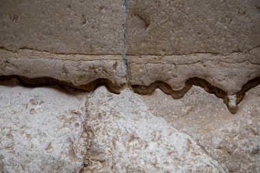 Soyut doğa dokusu. Kaya yüzeyi ya da bej dağ. Doğal malzeme geçmişi. Kaya tırmanışı arka planı, kopyalama alanı. Yüksek kalite fotoğraf