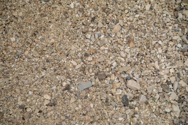 Soyut doğa dokusu. Kaya yüzeyi ya da bej dağ. Doğal malzeme geçmişi. Kaya tırmanışı arka planı, kopyalama alanı. Yüksek kalite fotoğraf