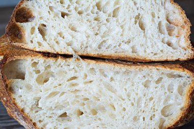 Taze gevrek ev yapımı ekşi ekmek ve tahıl unu. Sağlıklı yemek, doku..