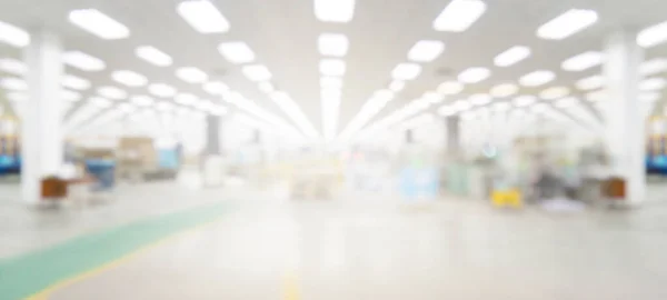 Fabrika ve depo binası, bulanık arkaplan.
