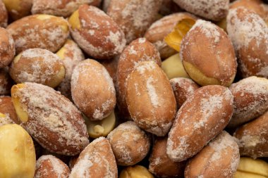 Yakın plan tuzlu fıstık. Yemek geçmişi. Atıştırmalık taze fındık..