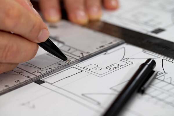Architect Engineer Design Working on Blueprint Planning Concept. Construction Concept. Selective focus