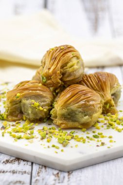 Fıstıklı midye Baklava. Yakın plan. Geleneksel Orta Doğu lezzetleri. Geleneksel Türk baklavası. yerel adı Midye Baklava