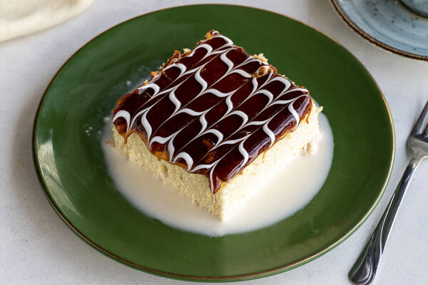 Caramel trilece cake. Trilece cake on a white background. . Bakery products. Close-up. local name trilece pasta